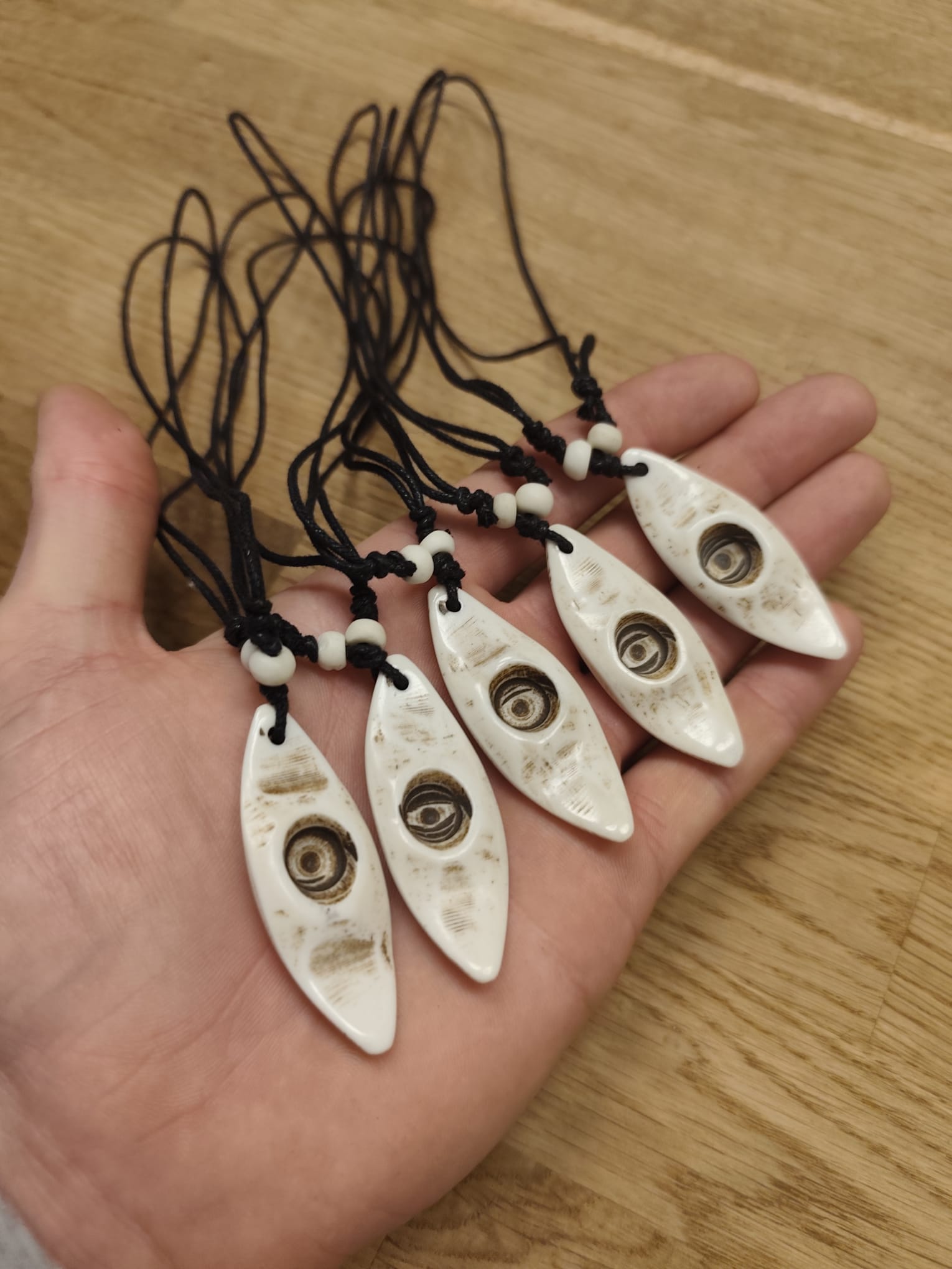 White kayak necklace